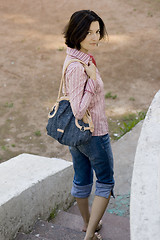 Image showing pretty brunet woman with bag