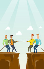 Image showing Two groups of business people pulling rope.