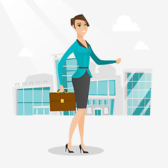 Image showing Successful business woman walking in the city.