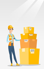 Image showing Warehouse worker scanning barcode on box.