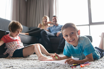 Image showing young couple spending time with kids