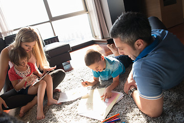 Image showing young couple spending time with kids