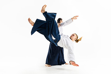 Image showing Man and woman fighting at Aikido training in martial arts school