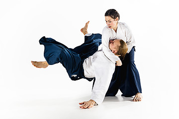 Image showing Man and woman fighting at Aikido training in martial arts school