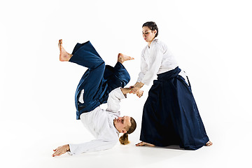 Image showing Man and woman fighting at Aikido training in martial arts school