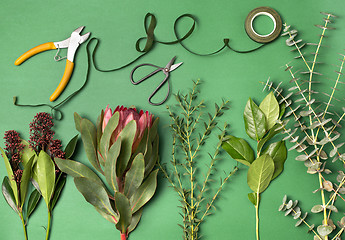 Image showing Tools and accessories florists need for making up a bouquet