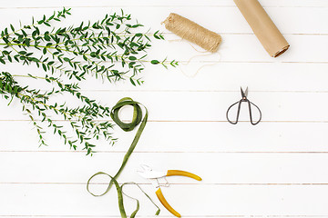 Image showing Tools and accessories florists need for making up a bouquet