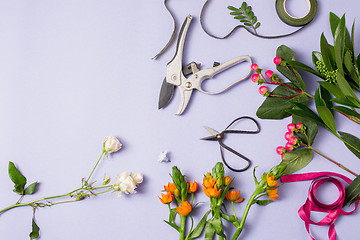 Image showing Tools and accessories florists need for making up a bouquet