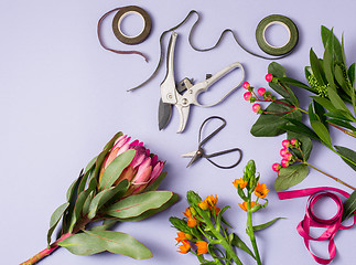 Image showing Tools and accessories florists need for making up a bouquet
