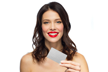 Image showing beautiful woman with red lipstick and credit card