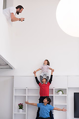 Image showing young boys posing line up piggyback