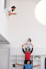 Image showing young boys posing line up piggyback