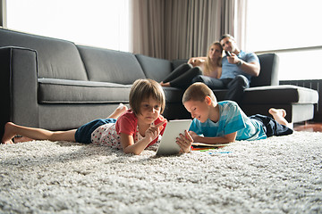 Image showing young couple spending time with kids