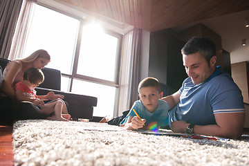 Image showing young couple spending time with kids