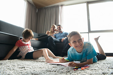 Image showing young couple spending time with kids