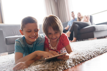 Image showing couple spending time with kids