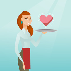 Image showing Waitress carrying a tray with a heart.