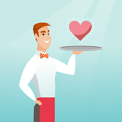 Image showing Waiter carrying a tray with a heart.