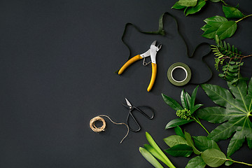 Image showing Tools and accessories florists need for making up a bouquet