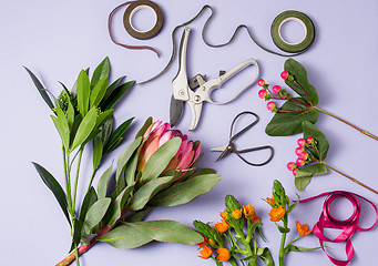 Image showing Tools and accessories florists need for making up a bouquet