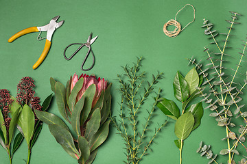 Image showing Tools and accessories florists need for making up a bouquet