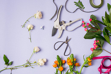 Image showing Tools and accessories florists need for making up a bouquet