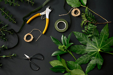 Image showing Tools and accessories florists need for making up a bouquet