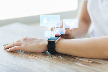 Image showing close up of smart watch with social media icons