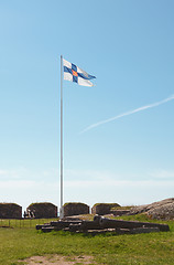 Image showing Finland state flag flying high on Suomenlinna