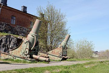 Image showing Two rusted green cannons on Suomenlinna island, Finland