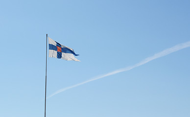 Image showing State flag of Finland flies from a flagpole 