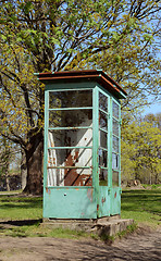 Image showing Weathered and rusted disused phone booth