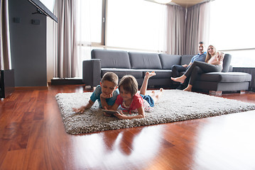 Image showing couple spending time with kids