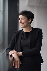 Image showing Portrait of successful Businesswoman by the window