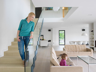 Image showing portrait of a young beautiful woman on the stairs