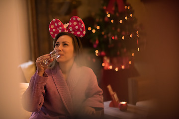 Image showing woman drinking champagne at spa