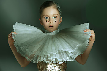 Image showing The fashion portrait of young beautiful teen girl at studio