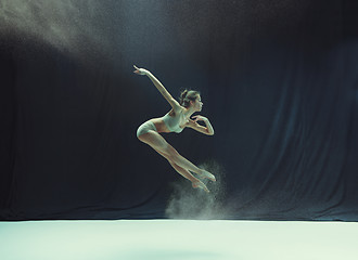 Image showing Young teen dancer on white floor background.