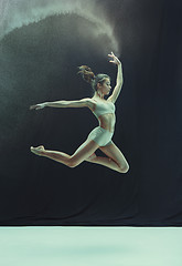 Image showing Young teen dancer on white floor background.