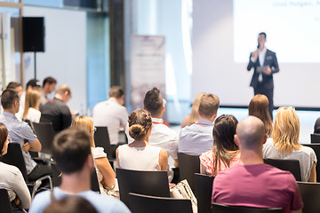 Image showing Business speaker giving a talk at business conference event.