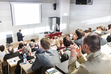 Image showing Business speaker giving a talk at business conference event.