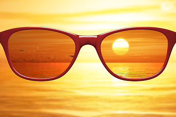 Image showing View through sunglasses sharp with glasses unsharp without glass