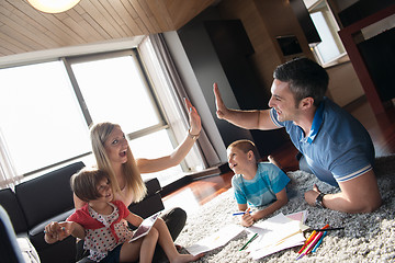 Image showing young couple spending time with kids