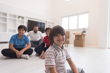 Image showing portrait of happy young boys with their dad