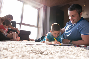 Image showing young couple spending time with kids