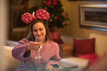 Image showing woman drinking champagne at spa