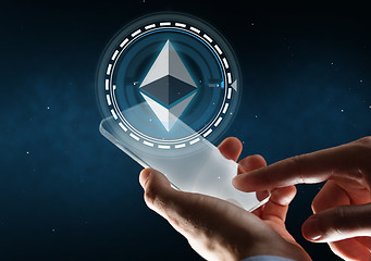 Image showing businessman with smartphone and ethereum hologram