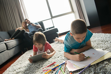 Image showing young couple spending time with kids