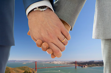 Image showing close up of gay couple over golden gate bridge