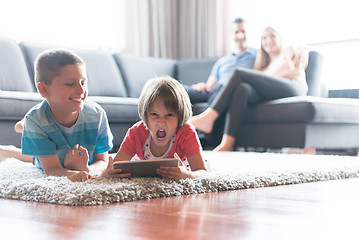 Image showing couple spending time with kids